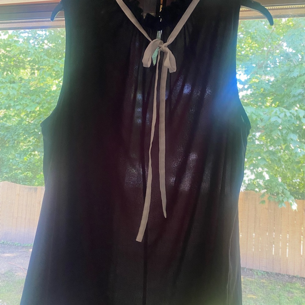 Black Sleeveless Top with White Tie Detail
